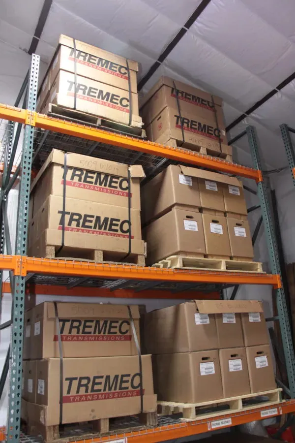 Many racks of transmissions stocked